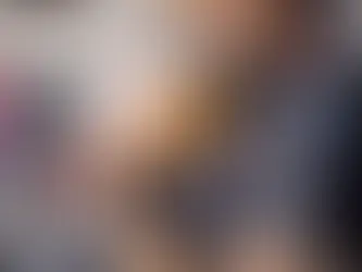 A veterinarian at VEG ER for Pets holds a guinea pig. 