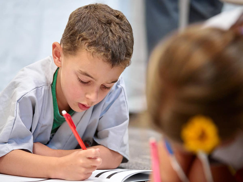 Little vet participant taking down medical records